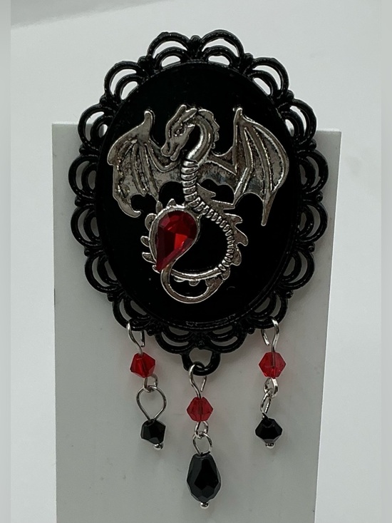 Jewelry - BLACK SILVER TONE DRAGON ARTICULATED BEAD BROOCH WITH RED ACCENTS NWOT GOTH